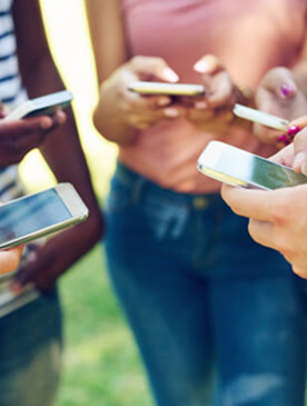 People looking at phone.