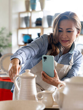 retail owner using phone