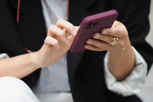 woman clicking social ad on phone